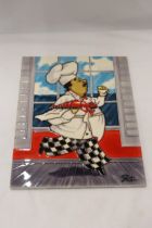 A LARGE TILE WITH A CHEF DESIGN, 28CM X 36CM