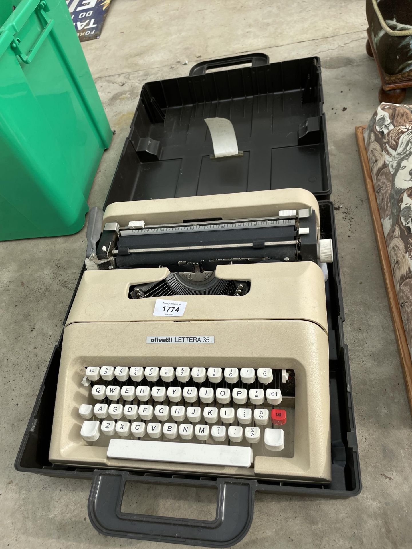 A RETRO OLIVETTI LETTERA 35 TYPEWRITER WITH CARRY CASE