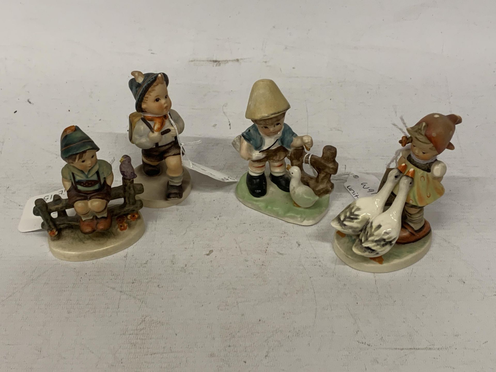 FOUR VARIOUS GOEBEL FIGURES