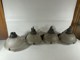 A SET OF FOUR VINTAGE HOLOPHANE 5 LAMPS WITH METAL FITTINGS AND CHAIN