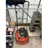 A FLYMO LAWN MOWER WITH HONDA ENGINE