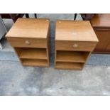 A PAIR OF TEAK EFFECT BEDSIDE TABLES