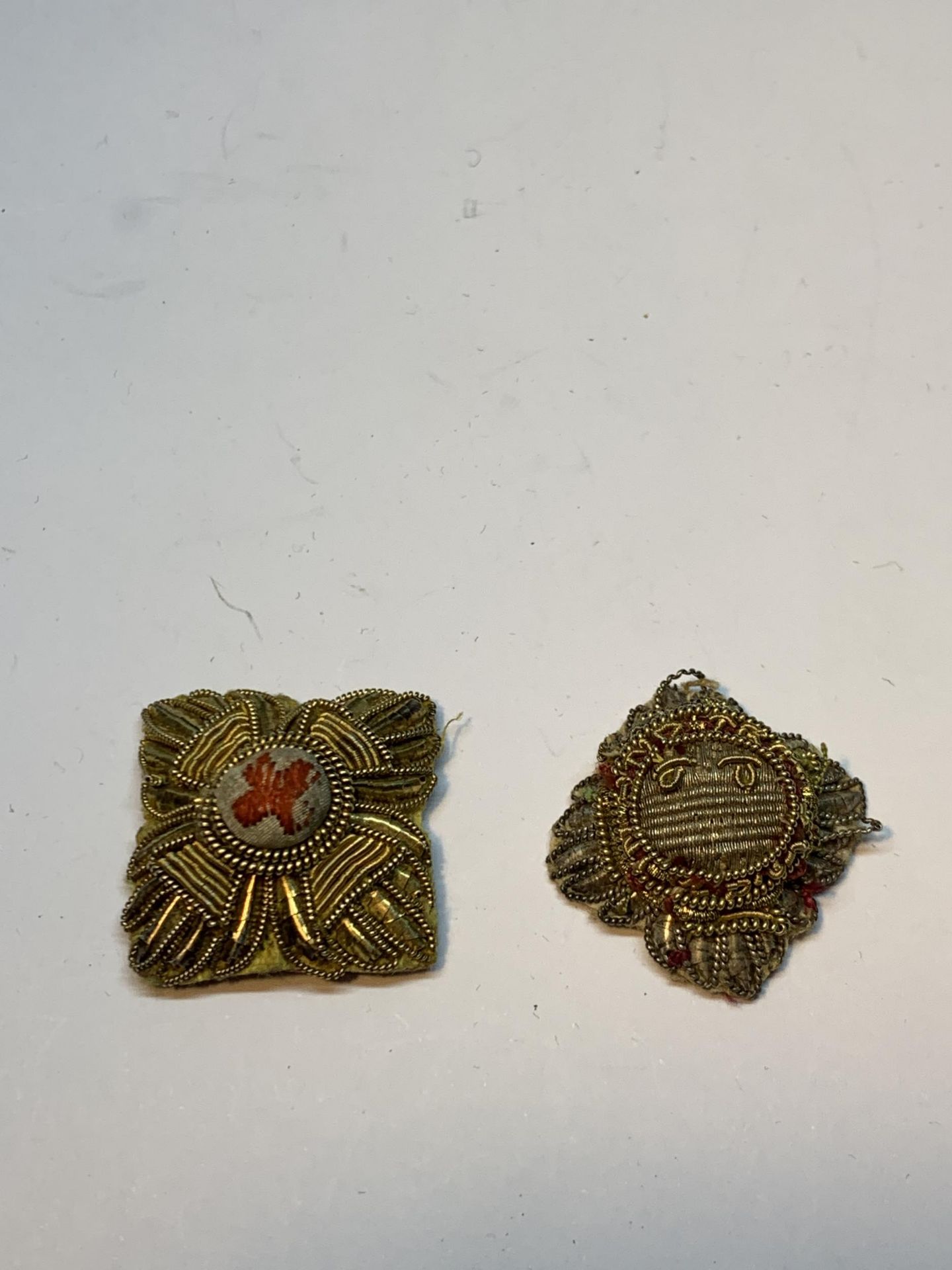 TWO GOLD THREAD MILITARY PIP BADGES
