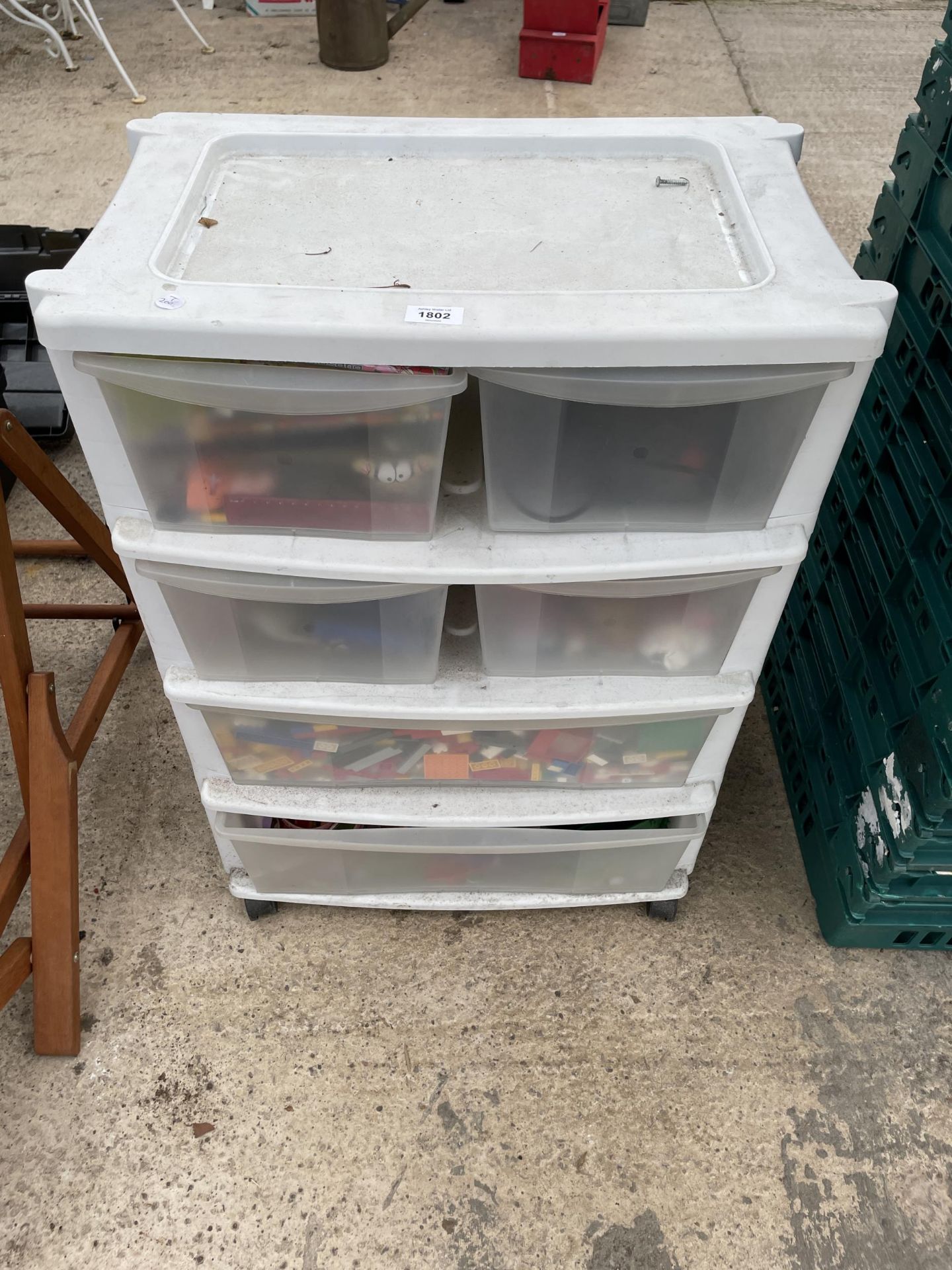 A PLASTIC STORAGE DRAWER UNIT WITH AN ASSORTMENT OF LEGO, XBOX GAMES AND OTHER TOYS ETC
