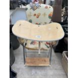 A VINTAGE CHILDS HIGH CHAIR