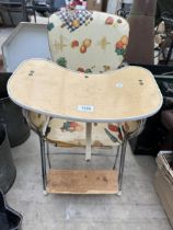 A VINTAGE CHILDS HIGH CHAIR
