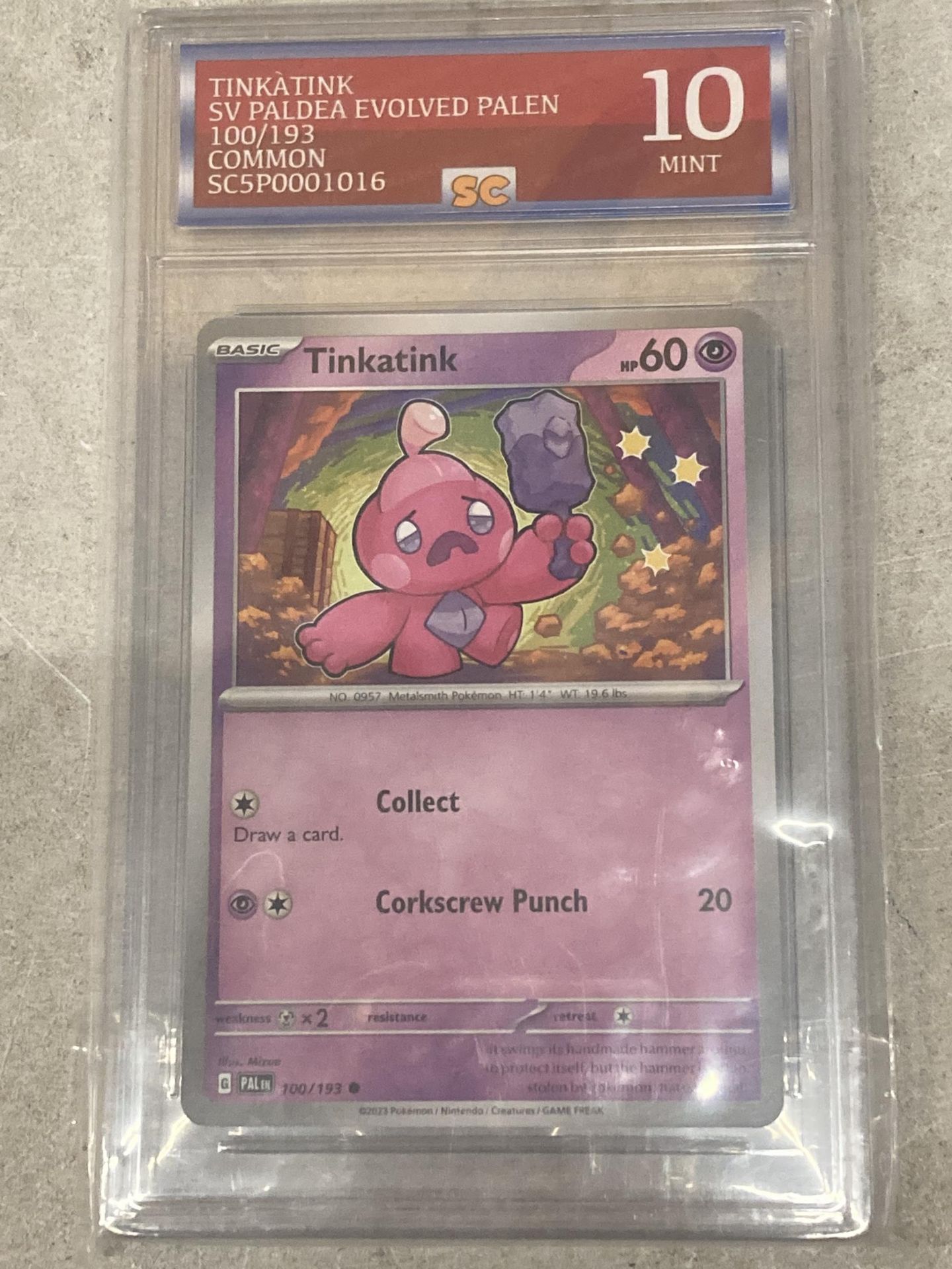 A GRADED 10/10 TINKATINK POKEMON CARD - PALDEA EVOLVED