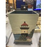 A WOODEN WASTE BIN WITH HAND PAINTED LIGHTHOUSE DESIGN, HEIGHT 34CM