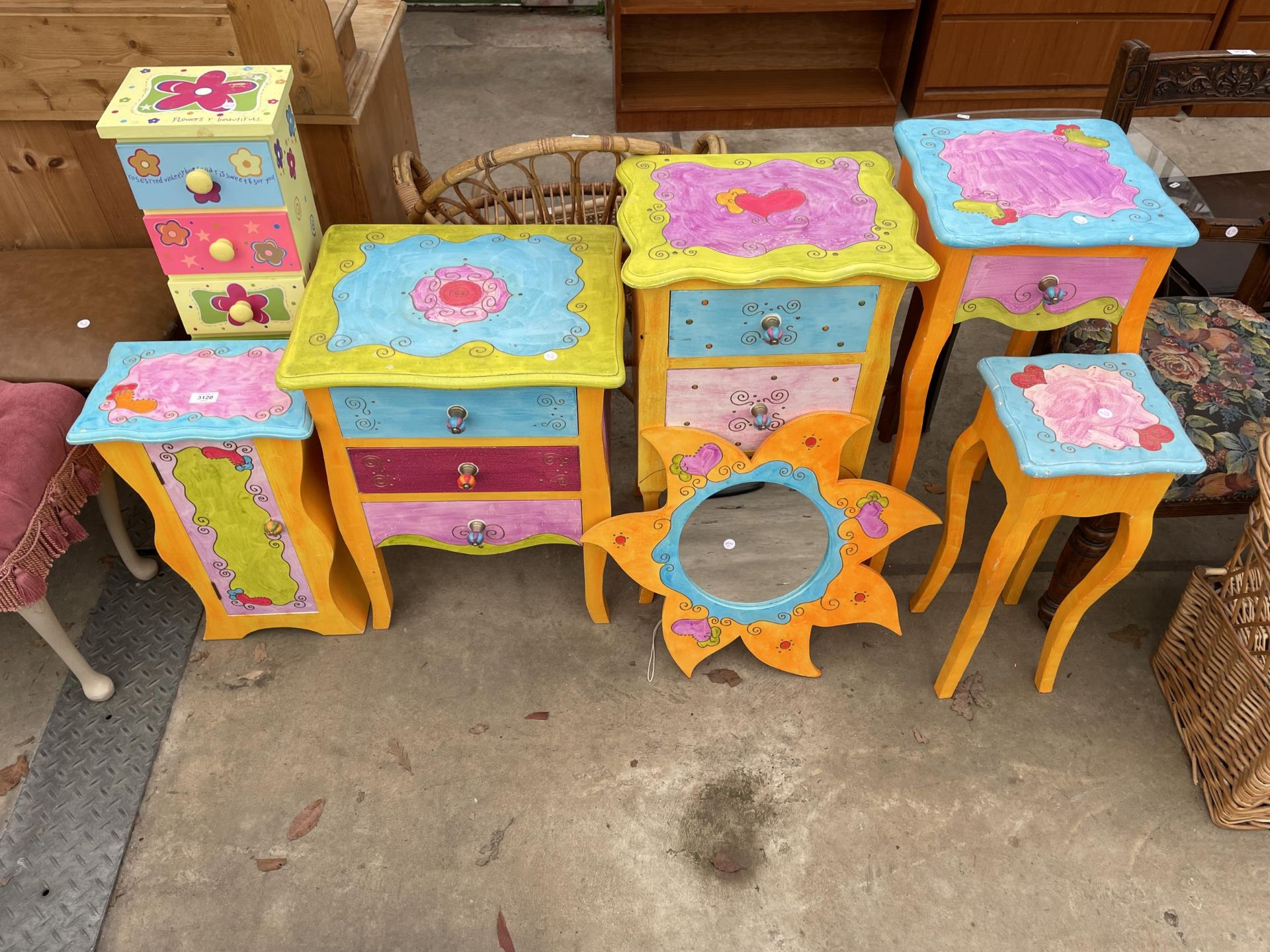 A RANGE OF BRIGHTLY PAINTED BEDTOOM FURNITURE, 3 CHESTS, MIRROR, CUPBOARDS AND SMALL TABLE