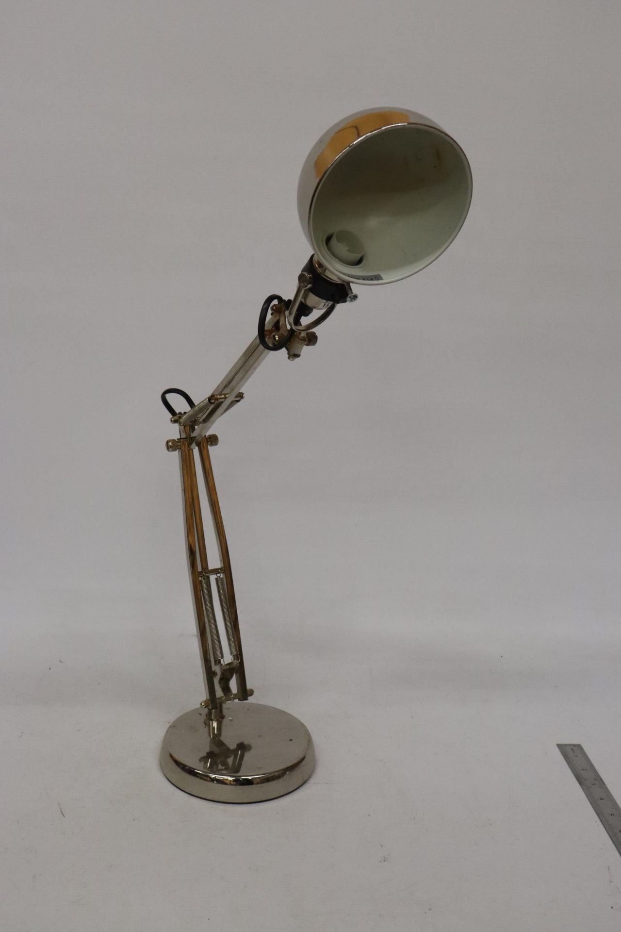 A HEAVY CHROME VINTAGE ANGLEPOISE LAMP