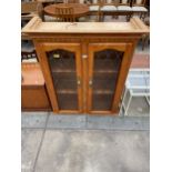 A MODERN TWO DOOR GLAZED AND LEADED BOOKCASE TOP 23" WIDE