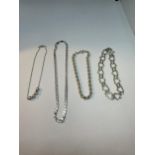 FOUR SILVER BRACELETS