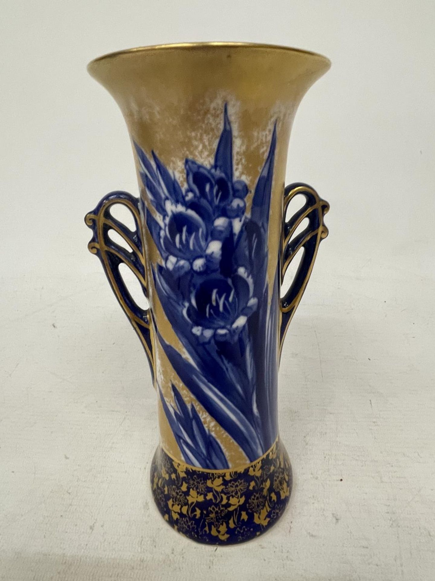 A DOULTON BURSLEMWARE TWIN HANDLED IRIS VASE