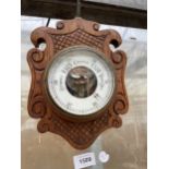 A SMALL OAK CASED WALL BAROMETER