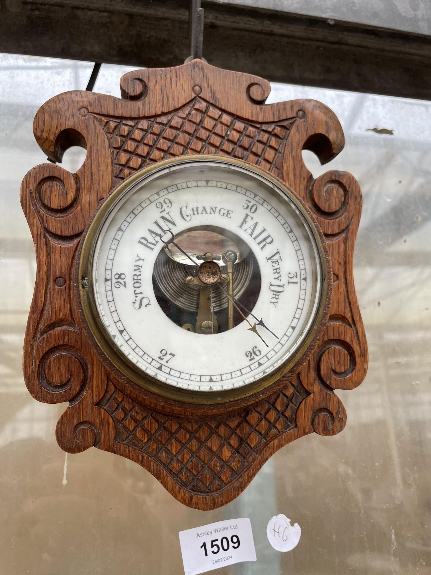 A SMALL OAK CASED WALL BAROMETER