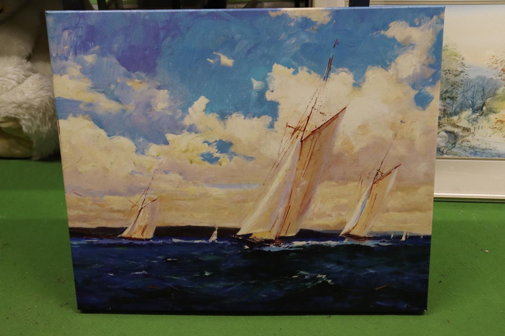 A CANVAS PRINT OF SAILING BOATS, 61CM X 52CM