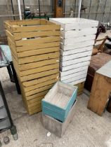 AN ASSORTMENT OF VINTAGE WOODEN CRATES AND BOXES