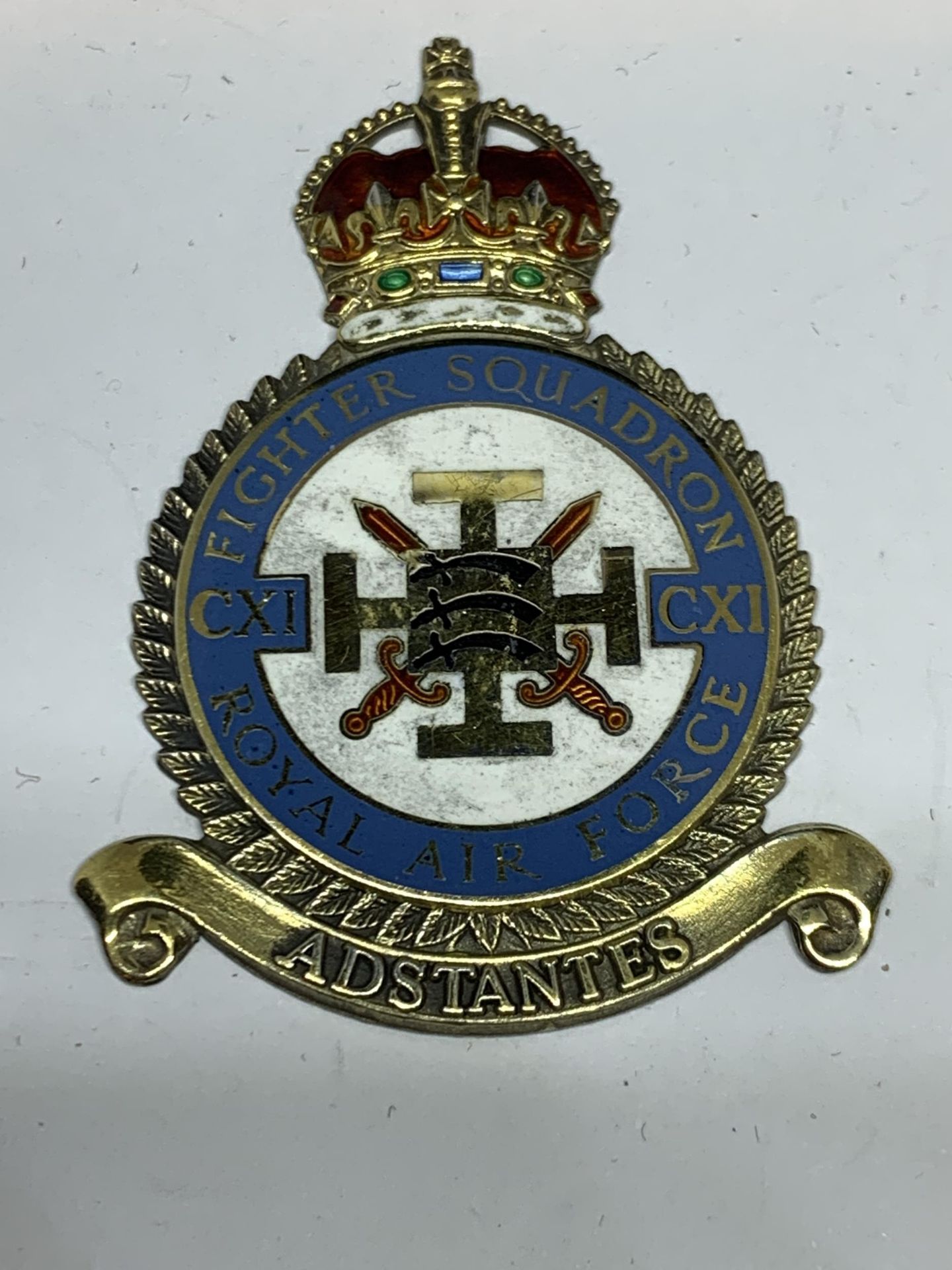 A HALLMARKED BIRMINGHAM SILVER AND ENAMEL ROYAL AIR FORCE FIGHTER SQUADRON CXI BADGE