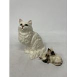 TWO BESWICK CATS TO INCLUDE A LARGE WHITE ONE NO 1867 AND A PAIR OF SIAMESE (EAR A/F)