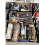 A LARGE ASSORTMENT OF TOOLS TO INCLUDE A WHEEL BRACE, COMPRESSOR FITTINGS AND BRUSHES ETC