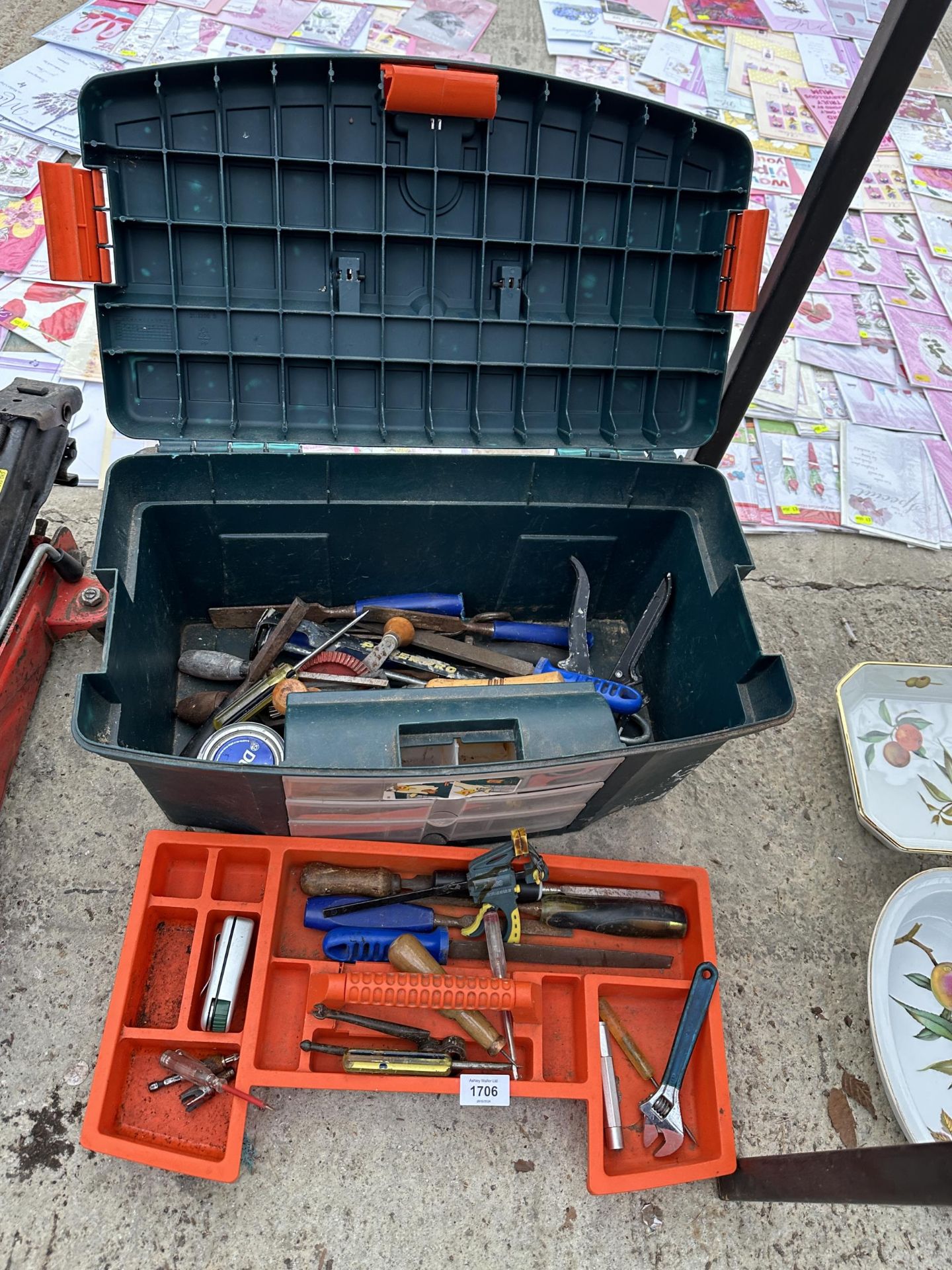 A PLASTIC TOOL BOX WITH AN ASSORTMENT OF TOOLS TO INCLUDE FILES, CHISELS AND SPANNERS ETC