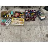 A LARGE ASSORTMENT OF MODEL VEHICLES AND TOYS TO INCLUDE CARS AND TRUCKS ETC