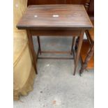 AN EDWARDIAN MAHOGANY AND IN LAID FOLD OVER GAMES TABLE