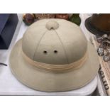 A PITH HELMET, SIZE 58CM