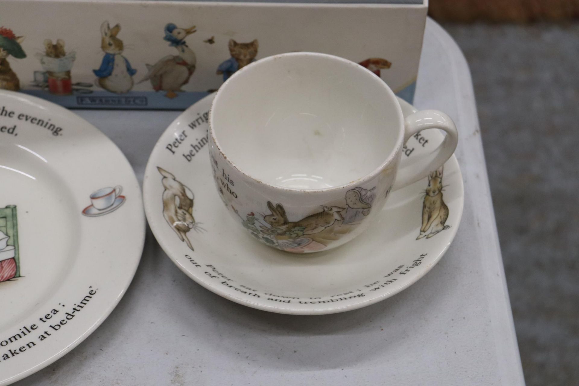 A BOXED 'THE WORLD OF PETER RABBIT' COLLECTION OF BOOKS PLUS THREE PIECES OF WEDGWOOD PETER RABBIT - Image 3 of 8