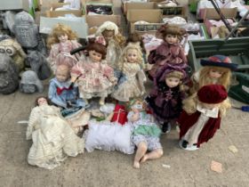AN ASSORTMENT OF DOLLS WITH PORCELAIN HEADS AND VARIOUS ACCESSORIES ETC