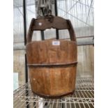 A VINTAGE OAK PAIL BUCKET WITH IRON BANDING AND LOOP