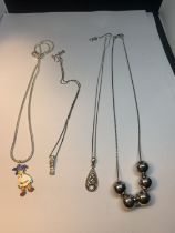 FOUR SILVER NECKLACES WITH PENDANTS