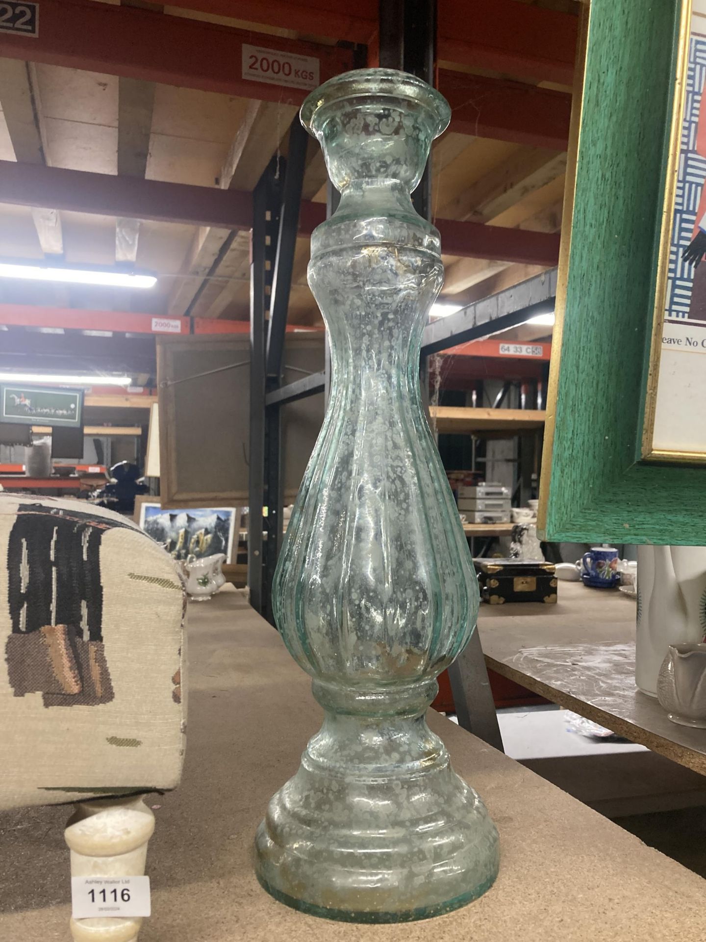 A VINTAGE TALL DECORATIVE GLASS DECANTER