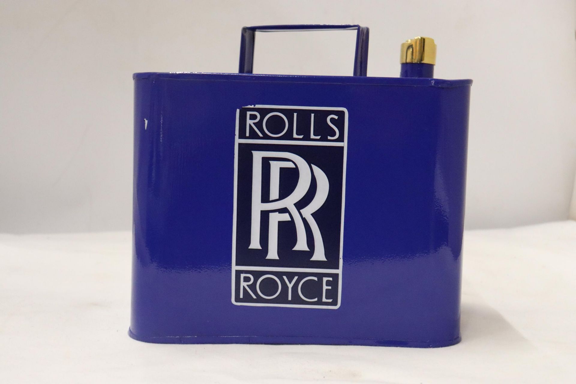 A BLUE ROLLS ROYCE OIL CAN