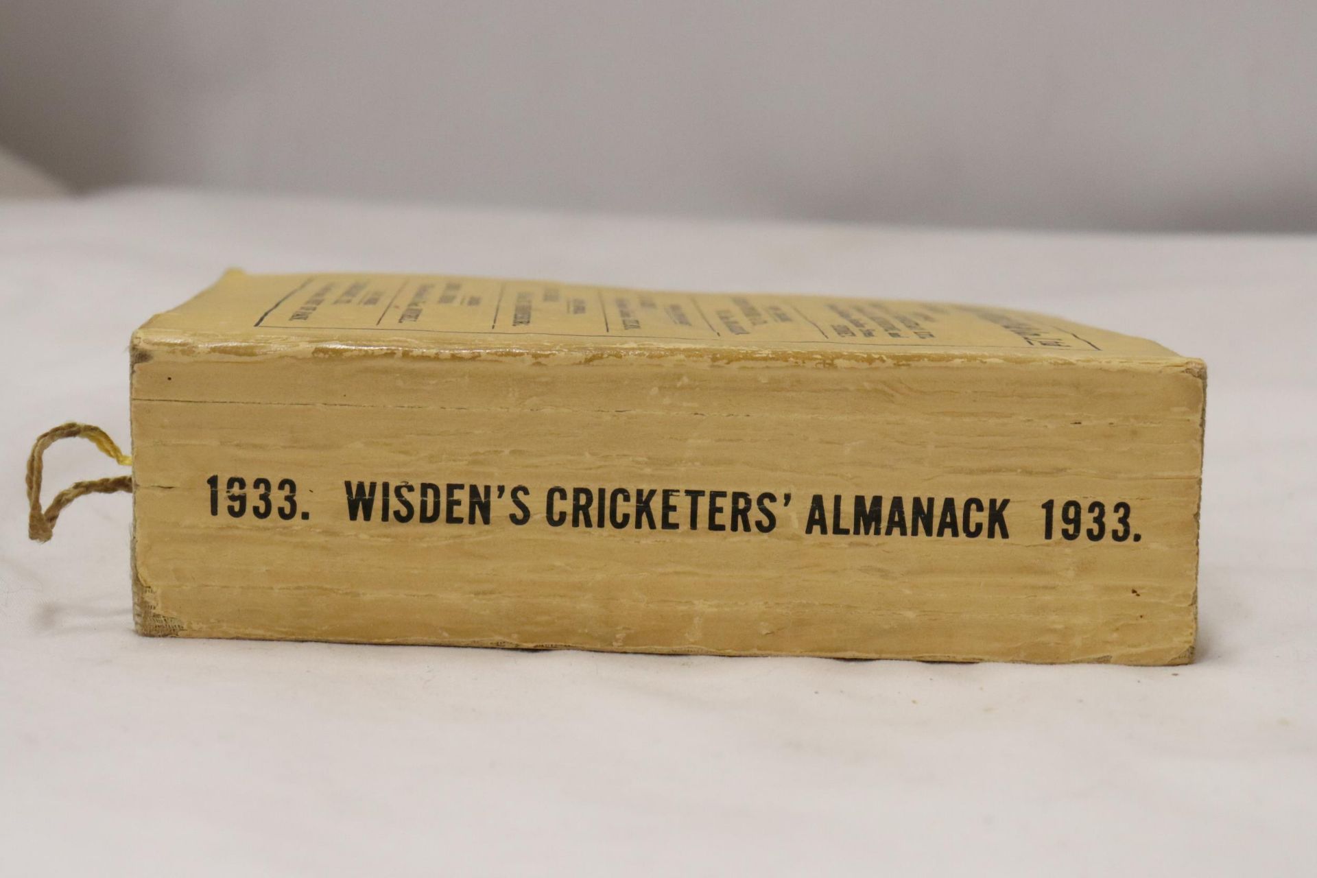 A 1933 COPY OF WISDEN'S CRICKETER'S ALMANACK. THIS COPY IS IN USED CONDITION, THE SPINE IS INTACT - Image 2 of 5