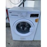 A WHITE BUSH WASHING MACHINE