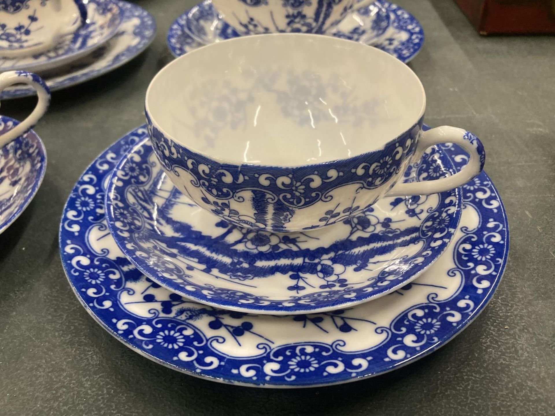 FIVE BLUE AND WHITE ORIENTAL EGGSHELL TEACUPS, SAUCERS AND FIVE SIDE PLATES - Image 2 of 5