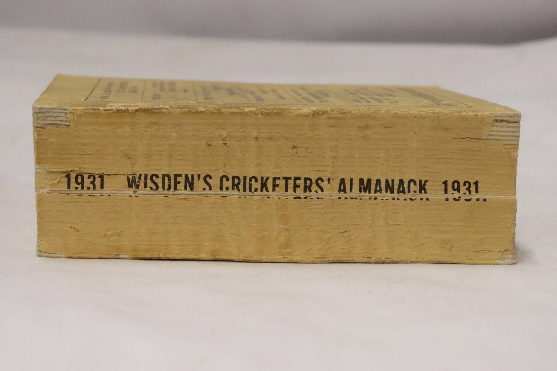 A 1931 COPY OF WISDEN'S CRICKETER'S ALMANACK. THIS COPY IS IN GOOD USED CONDITION, MISSING A SMALL - Image 2 of 4