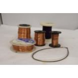 A QUANTITY OF COPPER WIRE ON SPOOLS