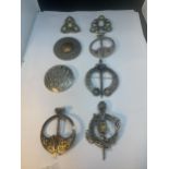 EIGHT VARIOUS CELTIC STYLE BROOCHES TO INCLUDE ST JUSTIN