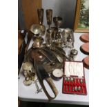 A LARGE QUANTITY OF SILVER PLATED ITEMS TO INCLUDE TRAYS, GOBLETS, A BOXED SET OF SPOONS, LADELS,