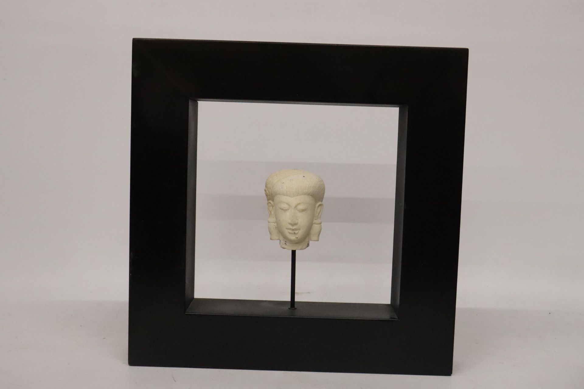 A FRAMED FENG SHUI BUDDAH IN OPEN SPACE, 35CM X 35CM