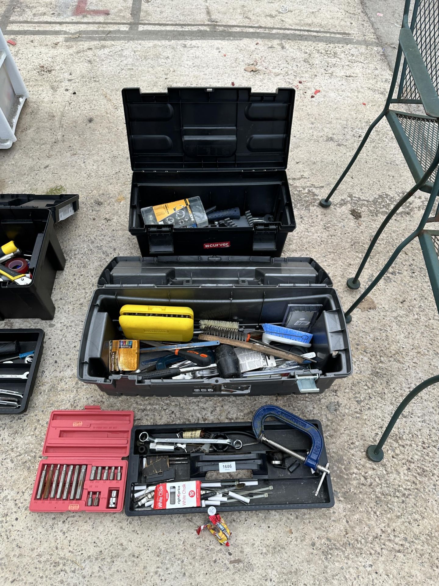 TWO PLASTIC TOOL BOXES WITH AN ASSORTMENT OF TOOLS TO INCLUDE A G CLAMP, HAMMERS AND WIRE BRUSHES