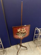 A 19TH CENTURY TAPESRTY POLE SCREEN