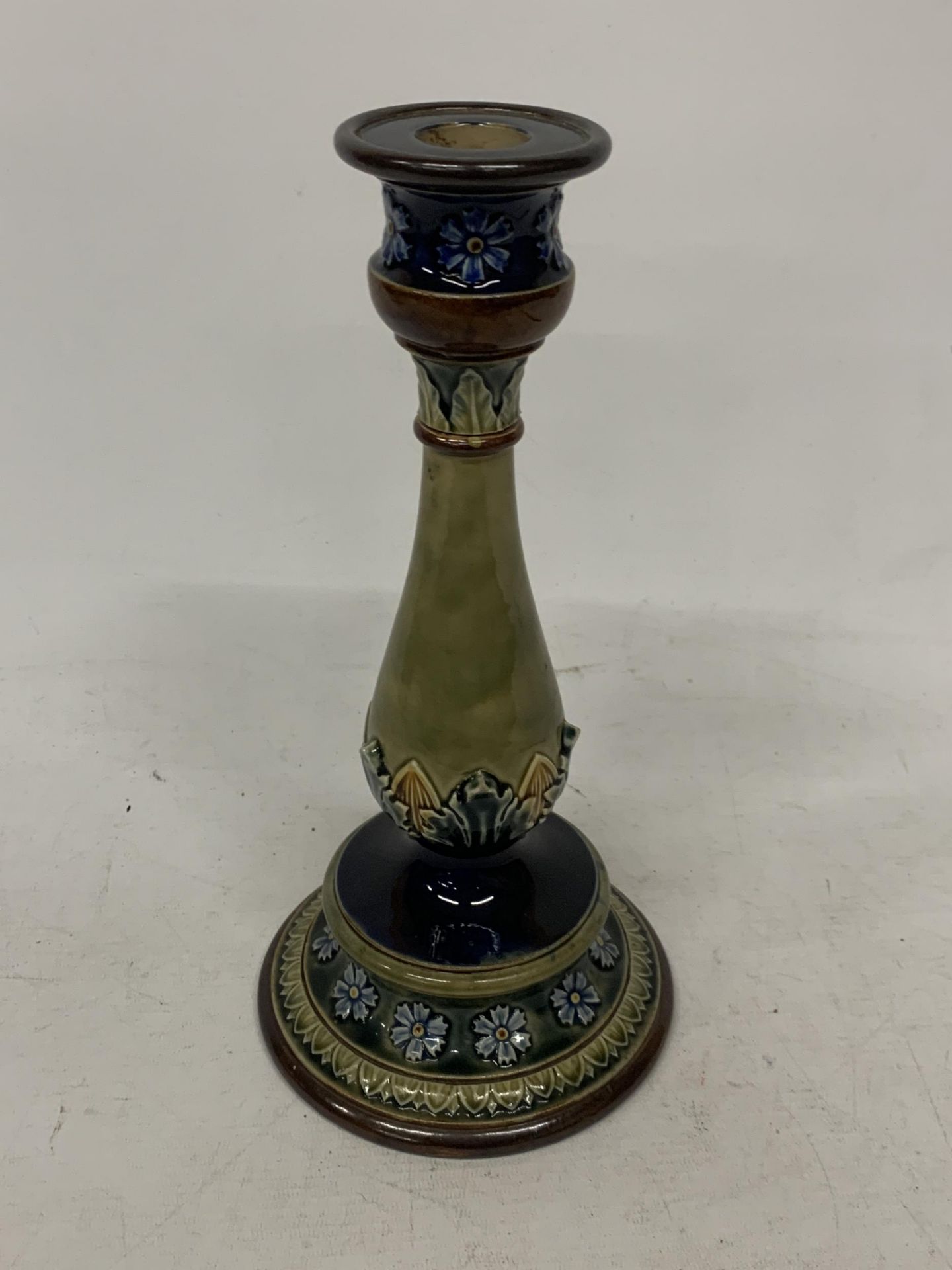 A LATE 19TH/EARLY 20TH CENTURY DOULTON LAMBETH STONEWARE CANDLESTICK