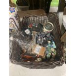 A BASKET CONTAINING COSTUME JEWELLER TO INCLUDE NEW AND CARDED