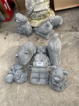 FIVE VARIOUS CONCRETE GARDEN FIGURES TO INCLUDE A LEGO MAN AND A GUINEA PIG ETC