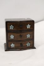 A SMALL WOODEN BOX WITH DRAWERS WITH INLAID PEARL ORIENTAL SCENE