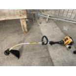 A JCB PETROL ENGINE GRASS STRIMMER