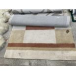 A SMALL CREAM PATTERNED FIRTH RUGS RUG